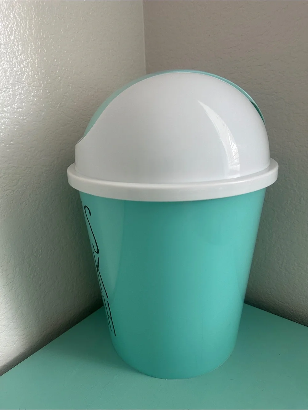 Essential Home Designs-basic plastic trash can with swinging top-new